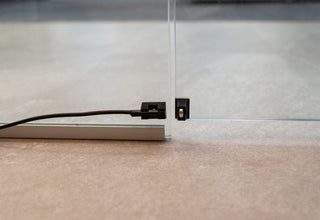 Harvia door sensor fitted to a glass sauna door